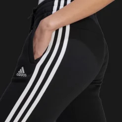 Essentials 3-Stripes Fleece Joggers, joggingbyxa dam - Fritidsbyxor - Essentials 3-Stripes Fleece Joggers, joggingbyxa dam