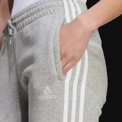 Essentials 3-Stripes Fleece Joggers, joggingbyxa dam - Fritidsbyxor - Essentials 3-Stripes Fleece Joggers, joggingbyxa dam